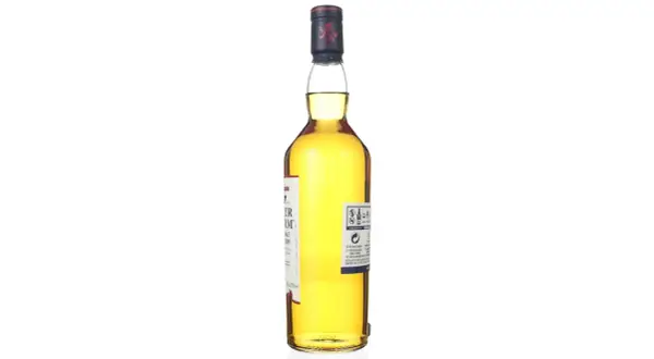 Bouteille de whisky Talisker Dark Storm, ambré, avec étiquette blanche et rouge. Le bouchon est bleu marine avec un lion rouge.